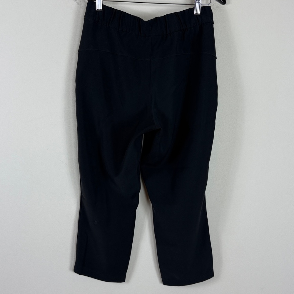 Lululemon On The Fly Crop Woven Pants 23” in Black Size 6 - Picture 6 of 10